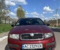 Красный Шкода Фабия, объемом двигателя 1.2 л и пробегом 218 тыс. км за 3300 $, фото 14 на Automoto.ua