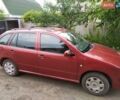 Красный Шкода Фабия, объемом двигателя 1.4 л и пробегом 208 тыс. км за 6300 $, фото 1 на Automoto.ua