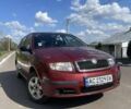 Красный Шкода Фабия, объемом двигателя 1.2 л и пробегом 218 тыс. км за 3300 $, фото 1 на Automoto.ua
