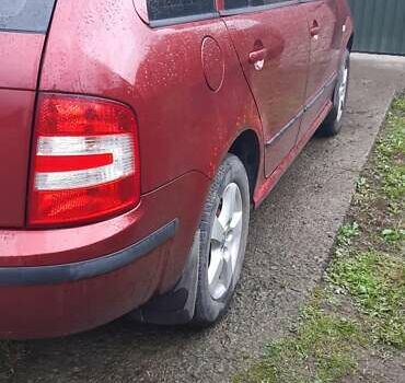 Красный Шкода Фабия, объемом двигателя 1.4 л и пробегом 255 тыс. км за 4100 $, фото 24 на Automoto.ua