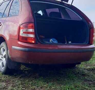 Красный Шкода Фабия, объемом двигателя 1.4 л и пробегом 255 тыс. км за 4100 $, фото 12 на Automoto.ua