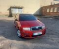 Красный Шкода Фабия, объемом двигателя 1.4 л и пробегом 292 тыс. км за 5000 $, фото 3 на Automoto.ua