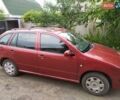 Красный Шкода Фабия, объемом двигателя 1.4 л и пробегом 208 тыс. км за 6300 $, фото 1 на Automoto.ua