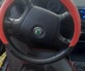 Красный Шкода Фабия, объемом двигателя 1.4 л и пробегом 255 тыс. км за 4100 $, фото 9 на Automoto.ua