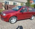 Красный Шкода Фабия, объемом двигателя 1.2 л и пробегом 204 тыс. км за 2750 $, фото 2 на Automoto.ua
