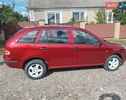 Красный Шкода Фабия, объемом двигателя 1.2 л и пробегом 204 тыс. км за 2850 $, фото 6 на Automoto.ua