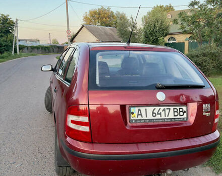 Красный Шкода Фабия, объемом двигателя 1.2 л и пробегом 310 тыс. км за 2750 $, фото 6 на Automoto.ua