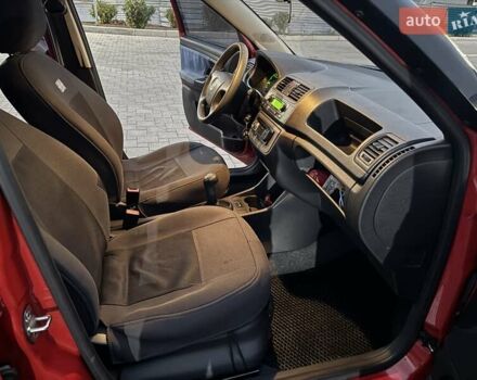 Красный Шкода Фабия, объемом двигателя 1.39 л и пробегом 146 тыс. км за 6200 $, фото 9 на Automoto.ua