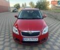 Красный Шкода Фабия, объемом двигателя 1.2 л и пробегом 206 тыс. км за 4000 $, фото 1 на Automoto.ua
