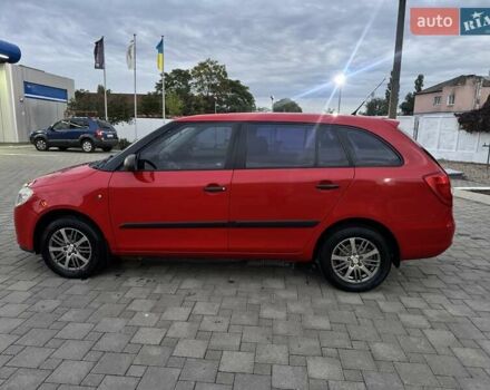 Красный Шкода Фабия, объемом двигателя 1.39 л и пробегом 146 тыс. км за 6200 $, фото 3 на Automoto.ua