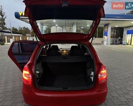 Красный Шкода Фабия, объемом двигателя 1.39 л и пробегом 146 тыс. км за 5500 $, фото 7 на Automoto.ua