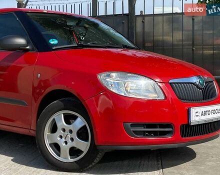 Красный Шкода Фабия, объемом двигателя 1.39 л и пробегом 258 тыс. км за 4690 $, фото 3 на Automoto.ua