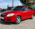 Красный Шкода Фабия, объемом двигателя 1.39 л и пробегом 258 тыс. км за 4690 $, фото 2 на Automoto.ua