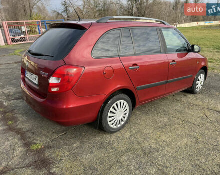 Красный Шкода Фабия, объемом двигателя 1.2 л и пробегом 292 тыс. км за 4600 $, фото 14 на Automoto.ua