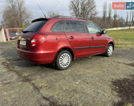 Красный Шкода Фабия, объемом двигателя 1.2 л и пробегом 292 тыс. км за 4600 $, фото 21 на Automoto.ua