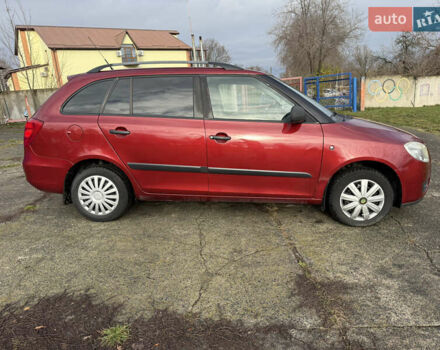Красный Шкода Фабия, объемом двигателя 1.2 л и пробегом 292 тыс. км за 4600 $, фото 11 на Automoto.ua
