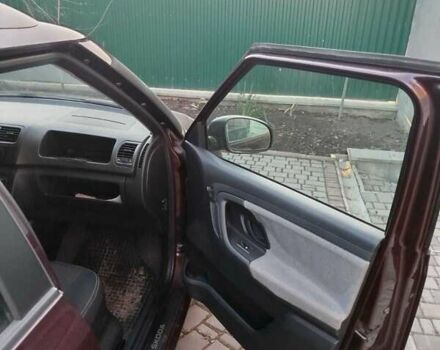 Червоний Шкода Фабія, об'ємом двигуна 1.4 л та пробігом 159 тис. км за 4950 $, фото 7 на Automoto.ua