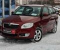 Красный Шкода Фабия, объемом двигателя 1.6 л и пробегом 220 тыс. км за 8490 $, фото 1 на Automoto.ua