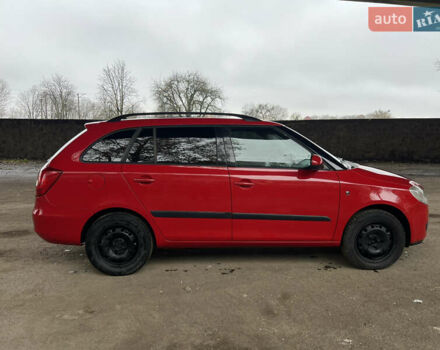 Красный Шкода Фабия, объемом двигателя 1.2 л и пробегом 247 тыс. км за 4199 $, фото 6 на Automoto.ua