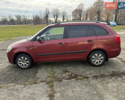 Красный Шкода Фабия, объемом двигателя 1.2 л и пробегом 292 тыс. км за 4600 $, фото 6 на Automoto.ua