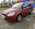 Красный Шкода Фабия, объемом двигателя 1.2 л и пробегом 292 тыс. км за 4600 $, фото 1 на Automoto.ua