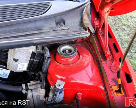 Шкода Фабия 2010 в Каменское - Днепродзержинск на Automoto.ua Красный Шкода Фабия, объемом двигателя 1.4 л и пробегом 235 тыс. км за 4100 $, фото 7 на Automoto.ua