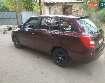 Красный Шкода Фабия, объемом двигателя 1.39 л и пробегом 260 тыс. км за 6000 $, фото 6 на Automoto.ua