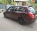 Красный Шкода Фабия, объемом двигателя 1.39 л и пробегом 260 тыс. км за 6000 $, фото 6 на Automoto.ua