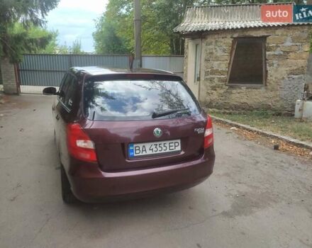 Красный Шкода Фабия, объемом двигателя 1.39 л и пробегом 260 тыс. км за 6000 $, фото 5 на Automoto.ua