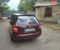 Красный Шкода Фабия, объемом двигателя 1.39 л и пробегом 260 тыс. км за 6000 $, фото 5 на Automoto.ua