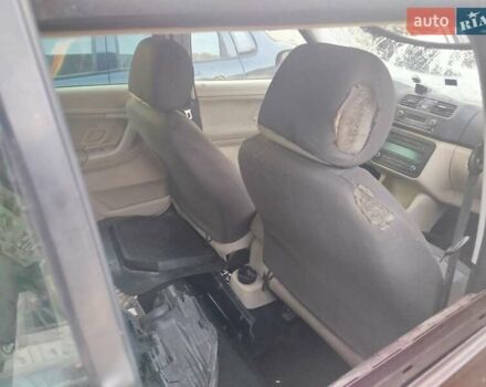 Красный Шкода Фабия, объемом двигателя 1.2 л и пробегом 110 тыс. км за 2500 $, фото 6 на Automoto.ua