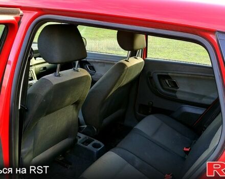 Шкода Фабия 2010 в Каменское - Днепродзержинск на Automoto.ua Красный Шкода Фабия, объемом двигателя 1.4 л и пробегом 235 тыс. км за 4100 $, фото 4 на Automoto.ua