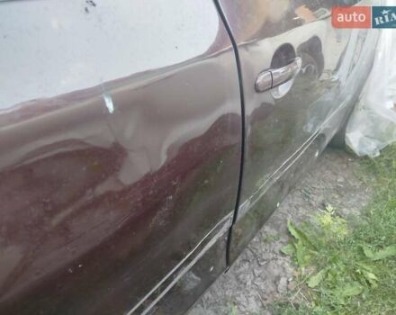Красный Шкода Фабия, объемом двигателя 1.2 л и пробегом 110 тыс. км за 2500 $, фото 3 на Automoto.ua