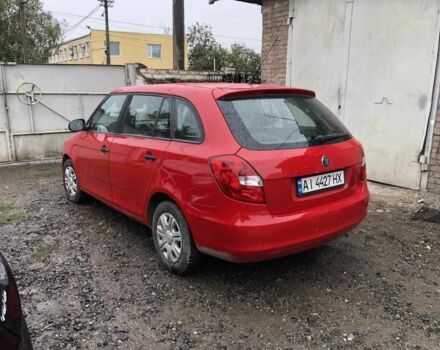 Красный Шкода Фабия, объемом двигателя 1.6 л и пробегом 217 тыс. км за 5200 $, фото 1 на Automoto.ua