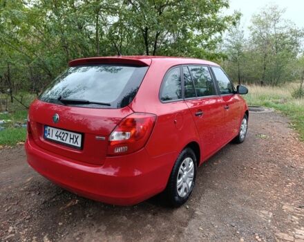 Красный Шкода Фабия, объемом двигателя 1.6 л и пробегом 217 тыс. км за 5200 $, фото 6 на Automoto.ua