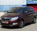 Красный Шкода Фабия, объемом двигателя 1.4 л и пробегом 164 тыс. км за 6640 $, фото 1 на Automoto.ua