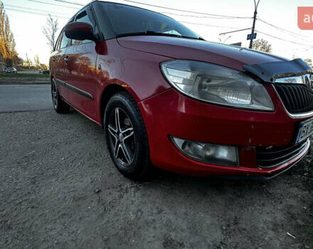 Красный Шкода Фабия, объемом двигателя 1.6 л и пробегом 423 тыс. км за 5500 $, фото 6 на Automoto.ua