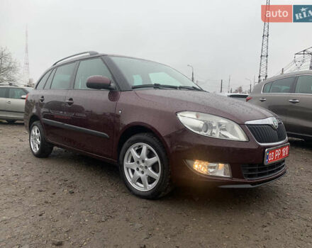 Красный Шкода Фабия, объемом двигателя 1.2 л и пробегом 222 тыс. км за 7800 $, фото 6 на Automoto.ua