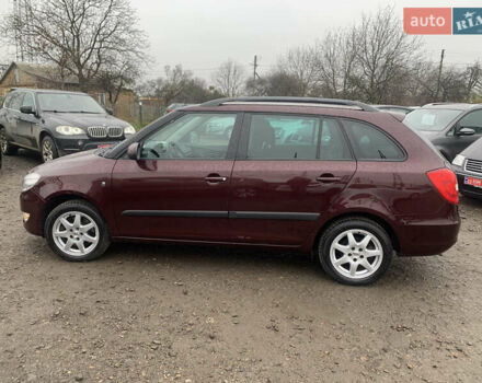 Красный Шкода Фабия, объемом двигателя 1.2 л и пробегом 222 тыс. км за 7800 $, фото 11 на Automoto.ua