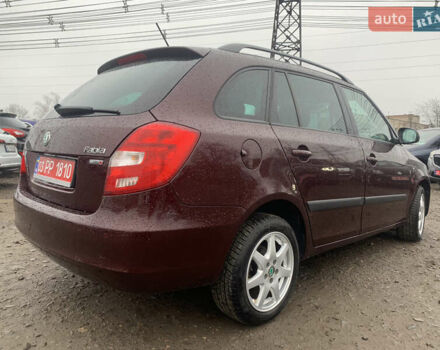 Красный Шкода Фабия, объемом двигателя 1.2 л и пробегом 222 тыс. км за 7800 $, фото 4 на Automoto.ua