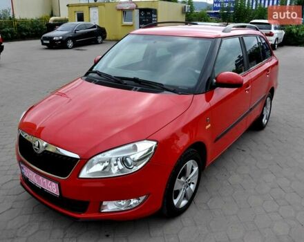 Красный Шкода Фабия, объемом двигателя 1.2 л и пробегом 174 тыс. км за 5999 $, фото 1 на Automoto.ua