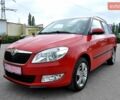 Красный Шкода Фабия, объемом двигателя 1.2 л и пробегом 174 тыс. км за 5999 $, фото 2 на Automoto.ua