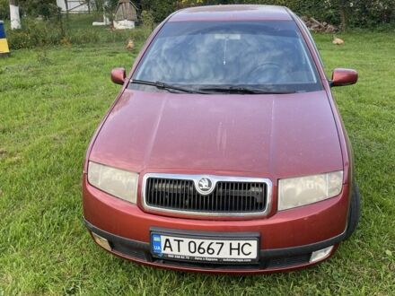Красный Шкода Фабия, объемом двигателя 1.4 л и пробегом 220 тыс. км за 2900 $, фото 1 на Automoto.ua
