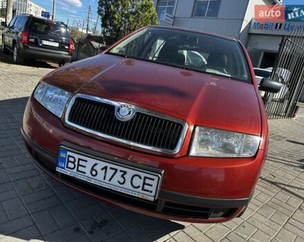 Красный Шкода Фабия, объемом двигателя 1.39 л и пробегом 180 тыс. км за 3900 $, фото 1 на Automoto.ua