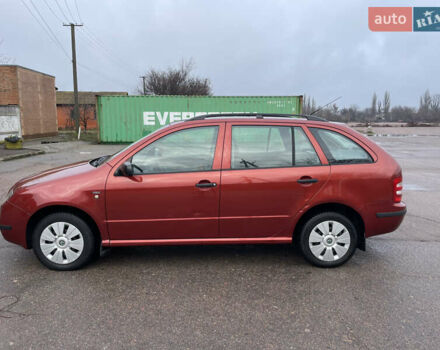 Красный Шкода Фабия, объемом двигателя 1.2 л и пробегом 217 тыс. км за 3550 $, фото 1 на Automoto.ua