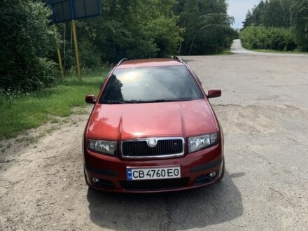 Красный Шкода Фабия, объемом двигателя 1.4 л и пробегом 238 тыс. км за 4350 $, фото 1 на Automoto.ua