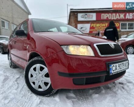 Красный Шкода Фабия, объемом двигателя 1.2 л и пробегом 247 тыс. км за 3700 $, фото 1 на Automoto.ua