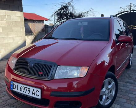 Красный Шкода Фабия, объемом двигателя 1.39 л и пробегом 250 тыс. км за 4000 $, фото 1 на Automoto.ua