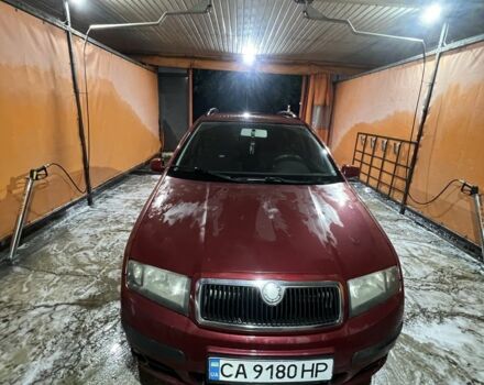 Красный Шкода Фабия, объемом двигателя 1.2 л и пробегом 303 тыс. км за 3800 $, фото 1 на Automoto.ua