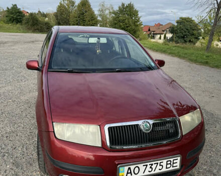 Червоний Шкода Фабія, об'ємом двигуна 1.2 л та пробігом 218 тис. км за 3900 $, фото 1 на Automoto.ua